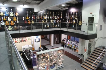 music store retail showroom with mezzanine floor
