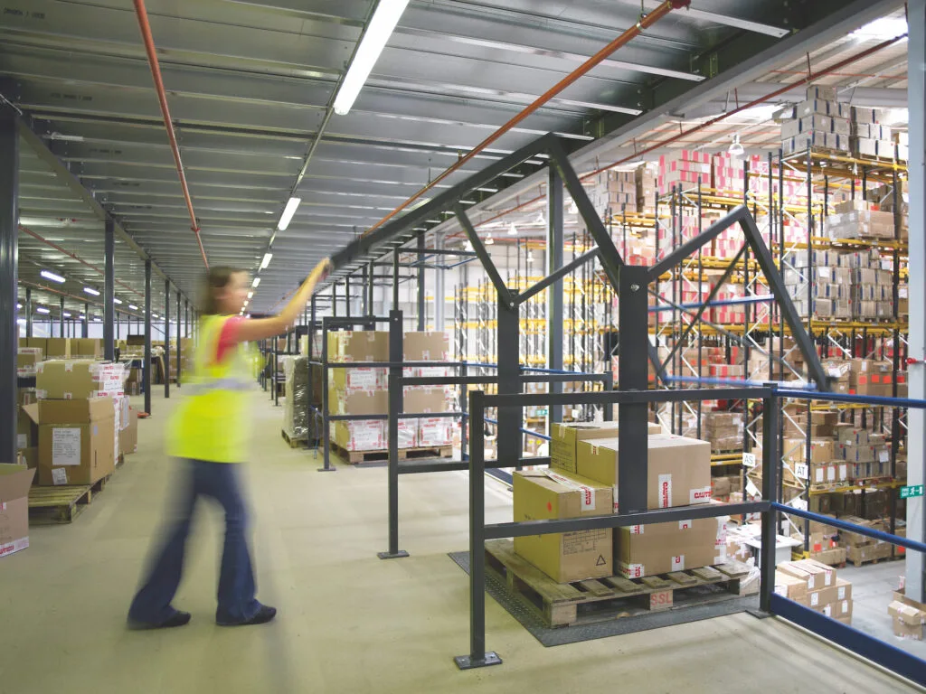 mezzanine floor pallet gate in use with pallet of boxes