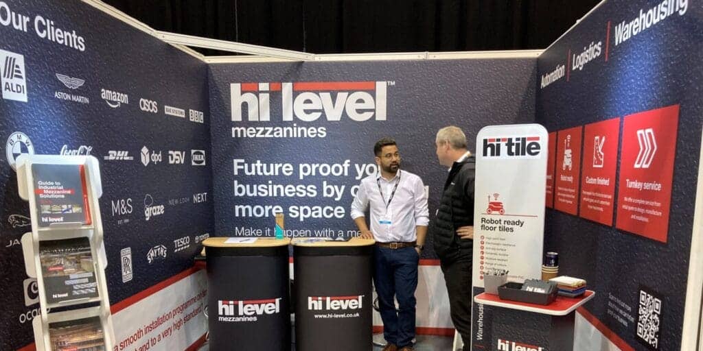 people on hi-level mezzanines exhibition stand
