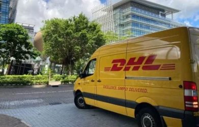 a DHL van in city